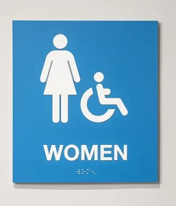 ADA signage woman's restroom